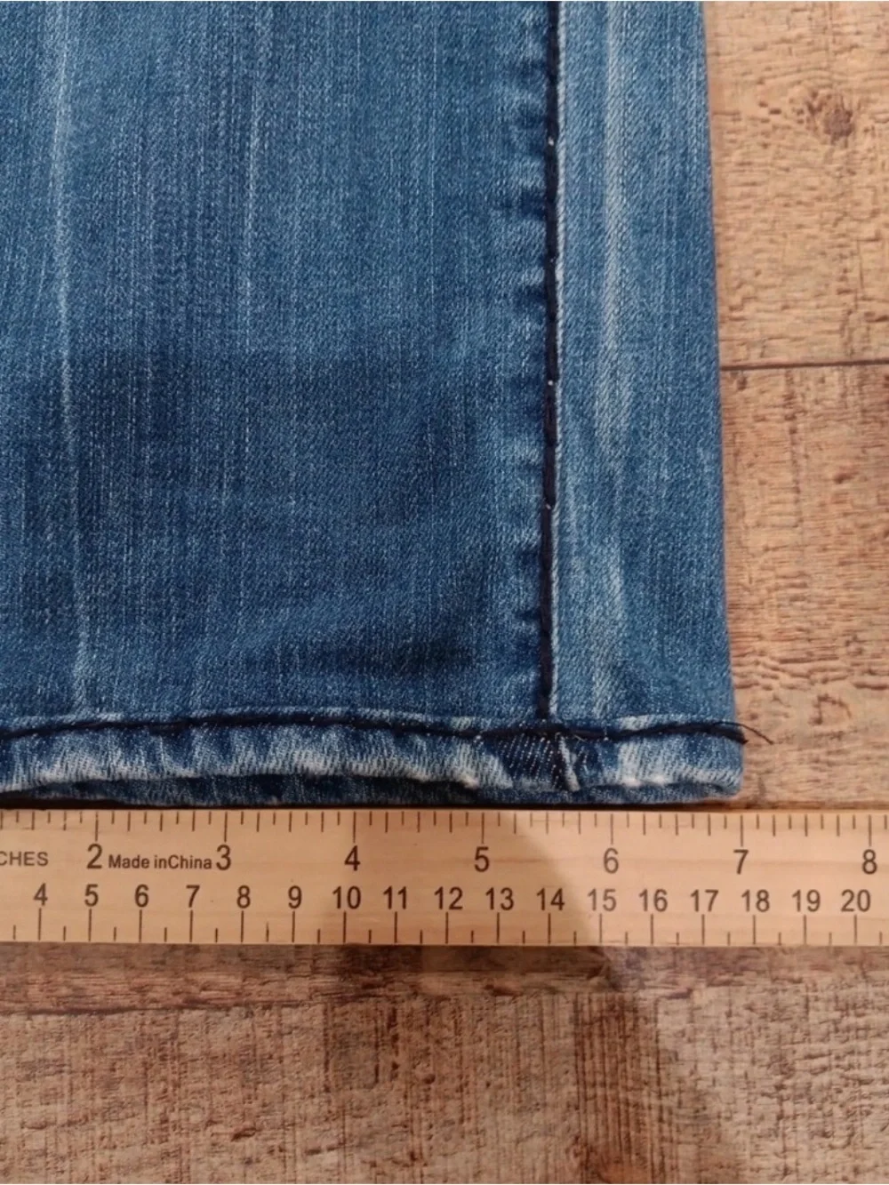 True Religion light blue jeans with red contrast stitching
